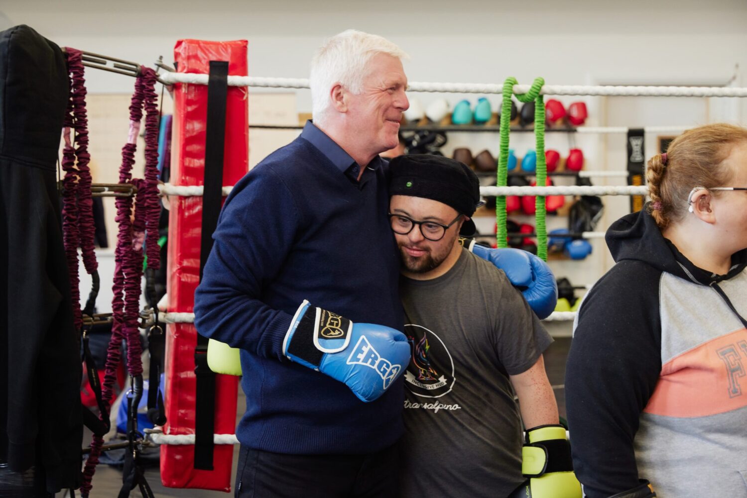 Steve Morgan Foundation Trustee with boxing regular giving a hug