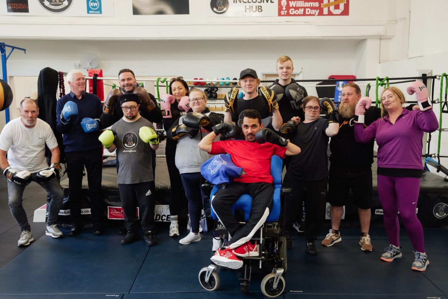 Adults with disabilities undertaking boxing workout at Inclusive Hub, Bottle 