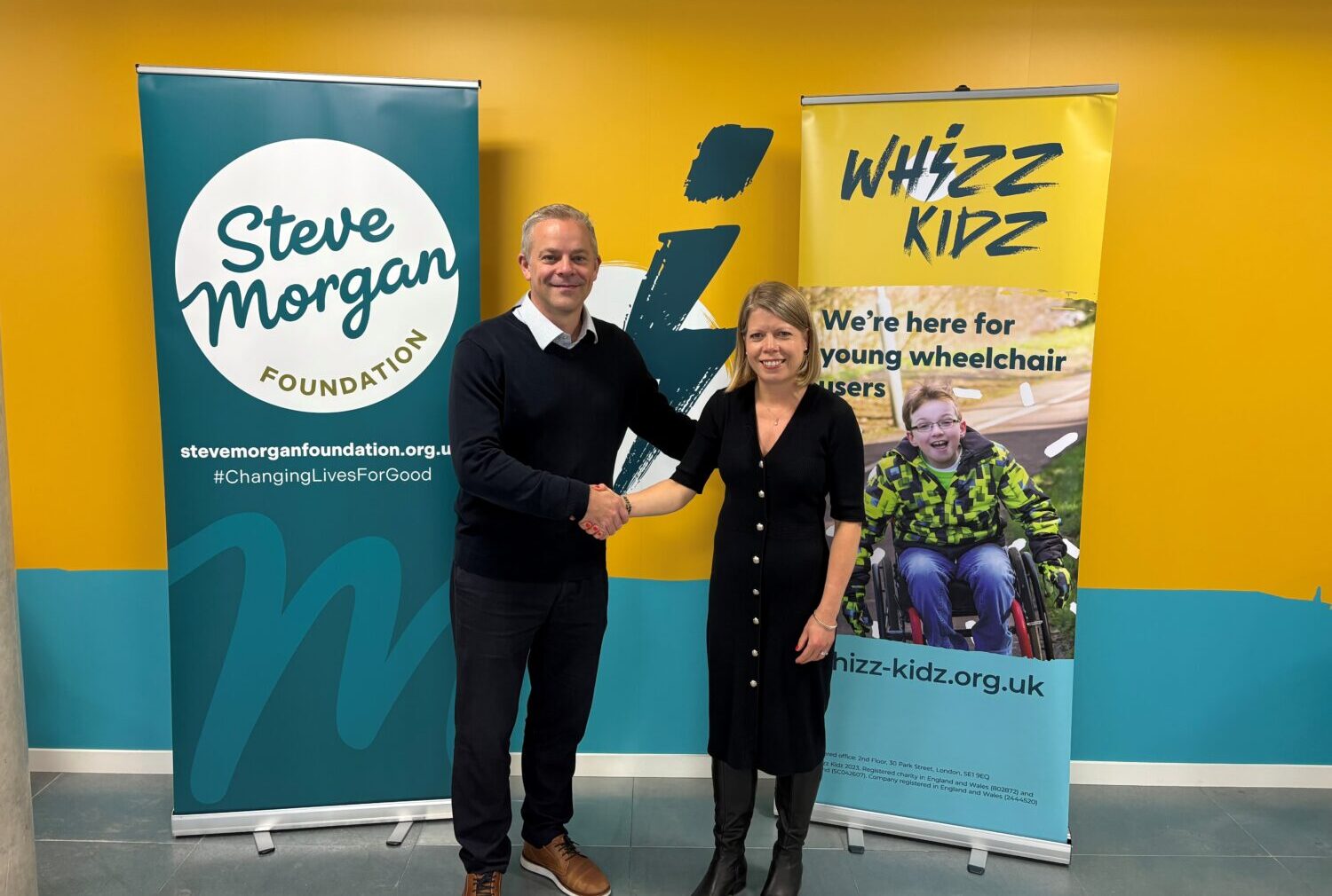 Liam Eaglestone, Steve Morgan Foundation and Sara Pugh, Whizz Kids shaking hands